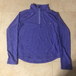 High necked purple and blue dri-fit jacket.